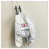 Mochila de Rayas de Gran Capacidad, Moda, Tendencia, Orejas de Conejo Lindas, 2026, Fresca, Moderna, Elegante, Diseño para Viajero