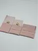Bolsas de empaque para joyería de gamuza al por mayor en stock, bolsitas de tapa abatible para collares y aretes, bolsas de almacenamiento para joyería