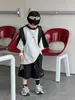 Tairu 2026 Nuevo Estilo de Verano Traje Deportivo Cortavientos de Secado Rápido Transpirable Estilo Coreano para Niños Niños, Pantalones Cortos Cómodos de Manga Corta, Moderno