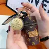 Couro Banhado a Ouro Padrão Vintage Bolsa Balde Mini Bolsa para Batom Chaveiro Estojo para Chave do Carro Estojo para Fone de Ouvido Fique Rico Logo Cavalo Pequeno