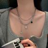 Collar de moda estilo hip hop para mujer, estilo frío, con diseño de nicho de circonita de color de alta calidad y cruz de acero de titanio dulce y fresco.