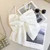 Camisola de Verano Nueva Estilo Lazo para Niñas 2026 Camisola Corta Ajustable Fresca de Camelia para Niños