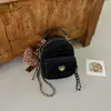 Mochila de viaje estilo coreano para mujer, nuevo modelo 2026, compacta y ligera, material PU, diseño único, correa de cadena