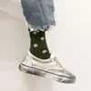 Calcetines de lunares dulces nuevos de otoño e invierno calcetines de lunares para niños estilo académico caricatura japonesa y coreana fabricantes de Liaoyuan al por mayor