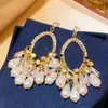 Pendientes Redondos Plegados con Borlas Tachonados de Pedrería Estilo Retro Europeo y Americano, de Moda y Versátiles, con un Toque de Lujo Ligero y de Alta Gama
