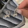 Pendientes con hebilla de lazo para mujer, diseño de nicho, exquisitos y dulces, elegantes y combinables, para novias.