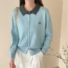 Colección de otoño: Cárdigan de punto bordado para mujer con cuello de solapa, nuevo estilo 2026, top suéter moderno de corte holgado