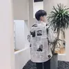 Camisa de Manga Larga con Estampado de Periódico Estilo Hong Kong Edición de EE. UU. Creativa Tendencia Callejera Holgada Precio de Fábrica