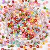 Accesorios para uñas con pequeñas flores de resina, populares para comercio exterior, 6 mm, mini flores frescas pastorales, paquete de material para decoración de uñas DIY