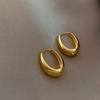 Pendientes geométricos retro de metal ovalado, diseño de nicho, de alta gama, ligeros y de lujo, con hebilla para la oreja, sencillos para mujer.