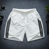 Pantalones cortos deportivos finos de tres barras de verano para hombre, pantalones de tres puntos holgados casuales de secado rápido para jóvenes