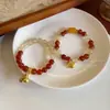 Pulsera Mezclada de Cristal Amarillo Torre Roja Ágata Roja para Mujer Diseño de Moda Nicho Nuevo Estilo Étnico Chino Pulsera de Bolsa de la Suerte Lingote