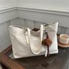 Bolso de mano retro de alta gama para mujer, de gran capacidad, estilo bandolera, estilo explosivo, 2025