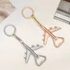 Nuevos Productos para el Hogar Personalidad Creativa Aleación de Zinc Abrebotellas de Avión Llavero Portátil Pequeño Abrebotellas Retro