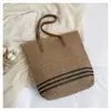 Bolso de paja para vacaciones en la playa, nuevo estilo 2026, bolso de hombro elegante y atractivo para el día a día, bolso tote tejido para mujer