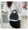 Bolso de verano simple para mujer 2026, nuevo bolso de mano con forma de concha, bolso cruzado de moda, bolso de hombro y bolso tote