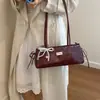 Bolsa de Axila Feminina Grande Capacidade 2026 Novo Estilo Design Nicho Francês High-End Tendência Bolsa de Ombro Único ou de Mão Bolsa Baguete