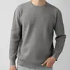 Suéter de punto acanalado a rayas estilo americano para hombre, invierno 2026, casual, de alta gama, color liso, tejido texturizado, moderno