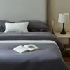 80 piezas Lanjing Tencel color liso doble costura juego de cuatro piezas suave amigable con la piel para dormir desnudo sensación de terciopelo lavado Tencel Cuatro Estaciones Universal