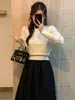 Suéter de punto suave de alta gama estilo coreano para mujer, nuevo modelo otoño/invierno 2026, rejuvenecedor, versátil, top de punto de cuello redondo, moderno