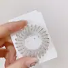 Trenza de tres cabos cuenta para uñas anillo de teléfono cuenta de perla tejida cable de teléfono transparente anillo para el pelo cuerda para la cabeza de alta elasticidad banda de goma