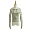 Sudadera con capucha de manga larga, color liso, corte ajustado, estilo europeo y americano para mujer, estilo callejero 2026, top corto de cintura alta, adelgazante