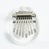 Mini piano de pulgar de 8 tonos de cristal pequeño lindo fácil de llevar mini colgante de celebridad de internet mini instrumento musical al por mayor