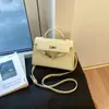 Bolso de Mano Texturizado de Nicho Estilo Francés 2025 Nuevo Bolso para Mujer Moda Bolso Cruzado Simple Cuadrado Pequeño Casual de Moda