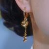 Elegantes y elegantes aretes de borla de bola de diamante marrón de lujo 2024 otoño e invierno nuevos aretes de moda simple comodín aretes