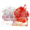 Bolsa de malla con copo de nieve repujado en oro transfronteriza, bolsa para empaquetar dulces navideños, bolsa de regalo para galletas y chocolates, bolsa transparente con cordón