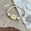 Namoradas explosivas gato de desenho animado fofo pulseira de corda trançada feita à mão design simples de nicho feminino corda de mão versátil atacado