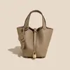 Bolso Canasta de Piel de Vaca de Primera Capa Clásico, Bolso Cubo de Piel Genuina de Lujo Ligero y de Gama Alta, Bolso de Mano de Moda Transfronteriza y Versátil