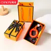 Chaveiro de anel de aperto criativo transfronteiriço para alívio de estresse, mini treinador de dedos colorido, dispositivo de aperto para alívio de estresse, pingente de mochila