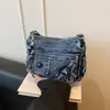 Bolsa de Ombro Cruzada Versátil para Meninas de Estilo de Rua Transfronteiriço Retrô Jeans Verão 2026 com Múltiplos Bolsos Nicho