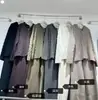 Conjunto de Duas Peças Tendência Feminino Outono e Inverno Novo Estilo Coreano Cardigã de Tricô Solto com Capuz e Calça Wide Leg