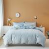 Conjunto de quatro peças de algodão com lavagem de lixa de cor sólida lençóis de colcha simples cama de dormitório estudantil chapéu de cama conjunto de três peças de micro-negócios tremores atacado