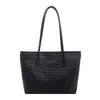 Bolso tote retro de moda transfronterizo para mujer 2026 verano nuevo color sólido tejido bandolera individual bolso para ir al trabajo axila