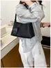 Bolso de axila tejido de textura nicho estilo francés transfronterizo para mujer, nuevo bolso de mano de moda 2026 para salir, bolso de hombro para el trabajo