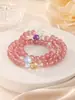 Nuevo brazalete de estilo chino con múltiples vueltas de cristal de fresa, accesorios de cristal de múltiples cuentas, estilo simple y delicado, accesorio de muñeca de cuentas redondas para mujer