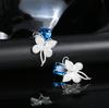 Flor Pérola micro-incrustado brincos de zircão brincos mulheres 2022 nova flor branca em forma de luz estilo luxo Coringa atacado