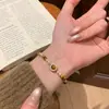 Pulsera de Piedra Ojo de Tigre Natural con Diamantes y Perlas Swarovski en Cordón Elástico, Única y Versátil en un Estilo Maillard de Nicho