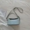 Bolso de Mujer 2026 Verano Nuevo Estilo Nicho Simple Moda Bolso de Mano para Viajar Bolso de Hombro Cruzado Tejido de Alto Valor