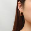 Pendientes de acero inoxidable irregulares con giro de moda transfronterizo europeo y americano, pendientes de moda de lujo ligeros y sencillos de estilo retro para mujer