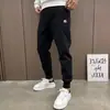 Pantalones de chándal para hombre de marca moderna Elásticos Ajustados Otoño Nuevos Modernos Caída Casual Pantalones Deportivos para Hombre Harem con Tobillo Atado