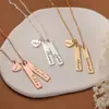 [Personalización Privada] Colgante de Collar con Nombre Grabado de Tira de Corazón de Acero Inoxidable Transfronterizo DIY Nombre Familiar
