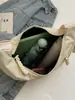 Bolsa de tela de gran capacidad para niñas, nueva bolsa de hombro cruzada de diseño casual niche estilo coreano, bolsa de albóndiga de alta gama