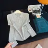 Blusa de tricô versátil e estilosa com gola polo para mulheres, novo modelo outono 2026, estilo Hong Kong, jovem e elegante, manga longa
