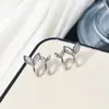Pendientes Dobles de Cola de Pez en Plata con Incrustaciones de Diamantes, Piedra Ojo de Gato Super Hada, Diseño de Nicho de Lujo Accesible, Pendientes Suaves, Compactos y Elegantes