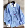 2026 Nueva Camisa de Rayas Color Block con Dobladillo Asimétrico, Camisa Cárdigan Estilo Boyfriend Top al por Mayor H12CT23302