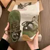 Nuevos zapatos de entrenamiento alemanes de suela gruesa originales de nicho chino para mujer 2026 Otoño nuevos zapatos blancos versátiles zapatos casuales de moda para mujer
